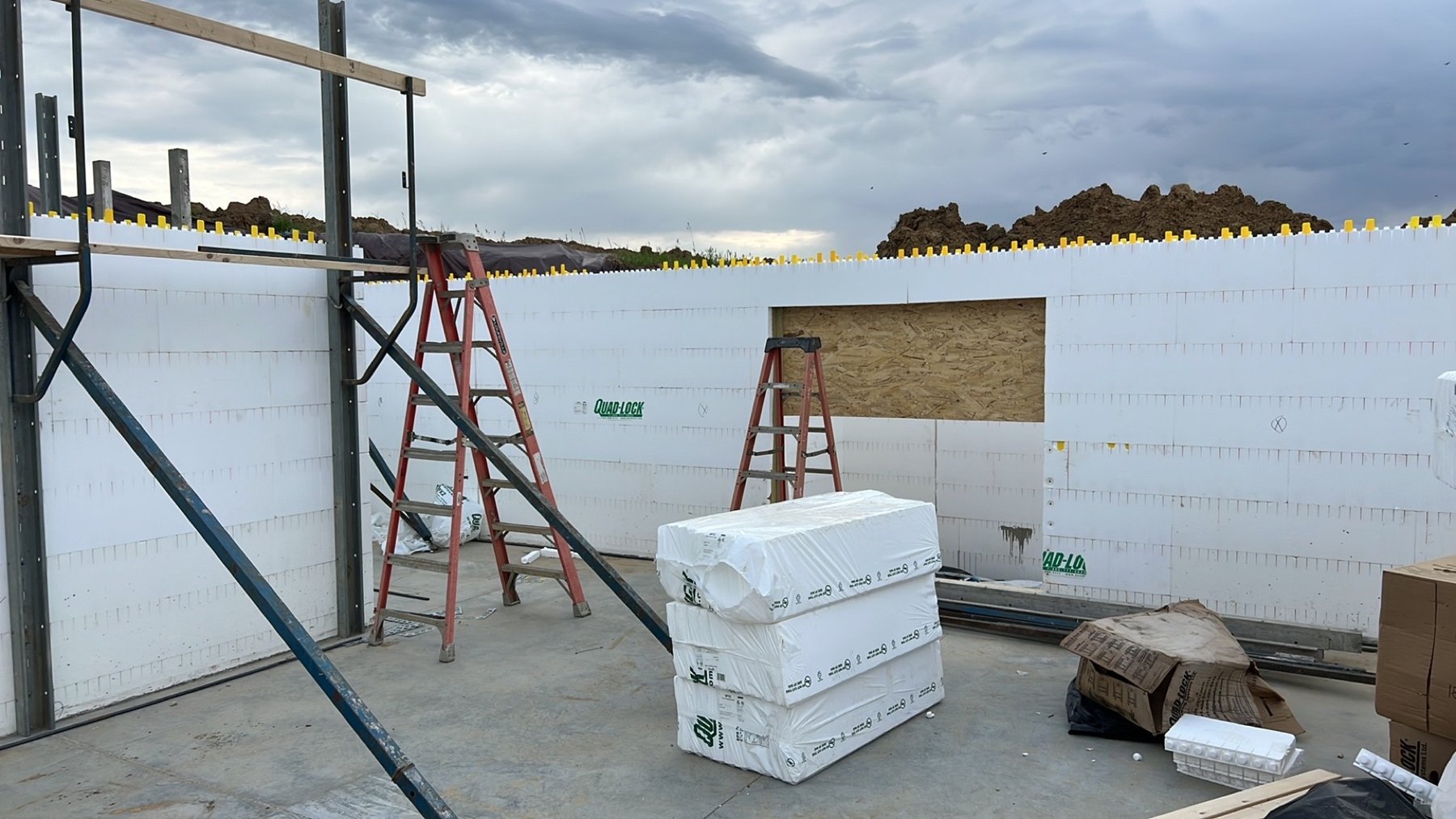 Insulated concrete form walls with window opening and alignment bracing